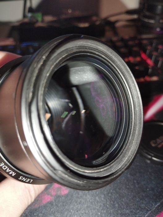 Canon EF 55-200mm f/4.5-5.6 II USM si Olympus 14-42mm f/3.5-5.6 EZ ED