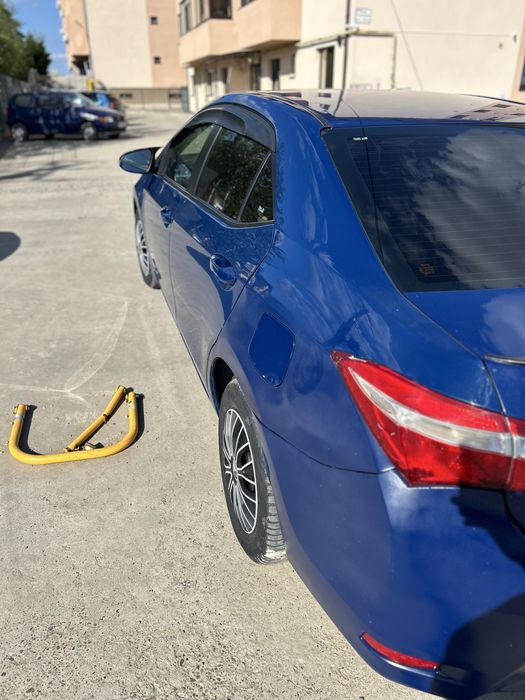 Vand Toyota Corolla an 2014, motor 1,4 benzina