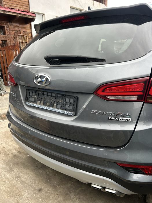Aripă stanga spate Hyundai Santa Fe 2016