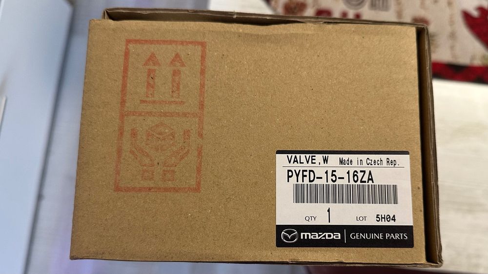 Genuine Cooling control valve Mazda (Корпус на Термостат)