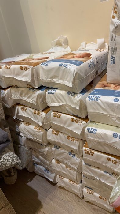 Продам много подгузников Алтын Бала