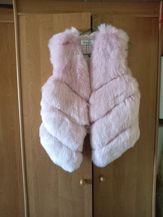 Жилетка новая  .