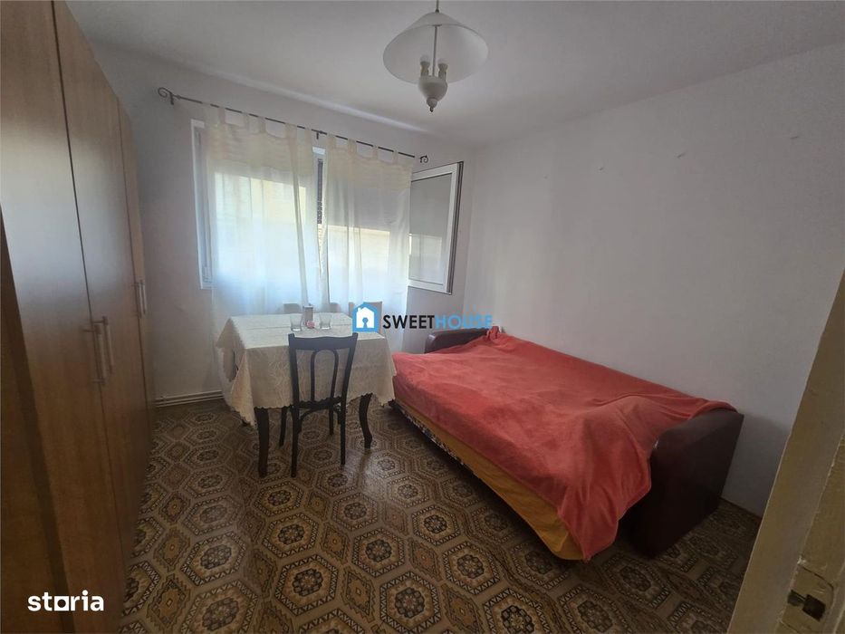 Apartament cu trei camere parter