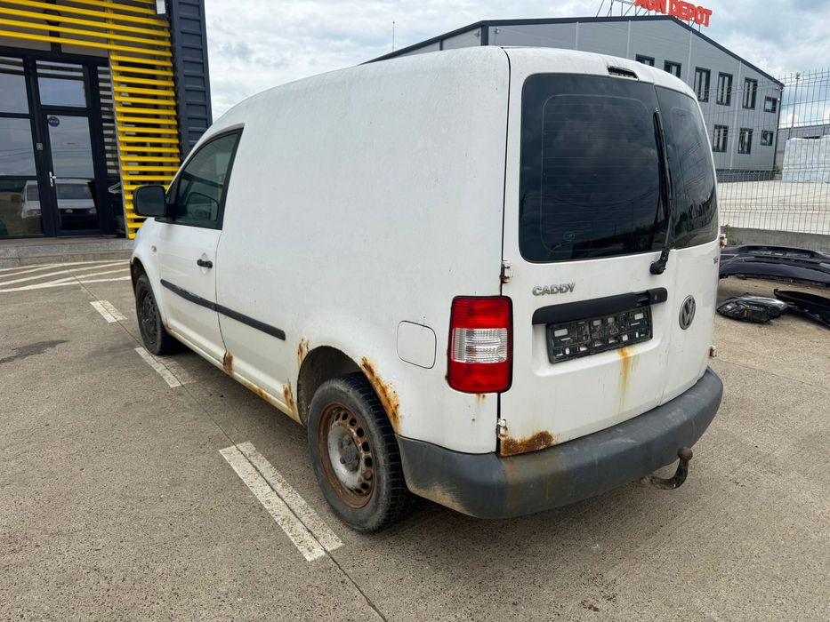 Dezmembrez Vw caddy 2008 alba 1.9 tdi BLS volan stanga cutie JCS
