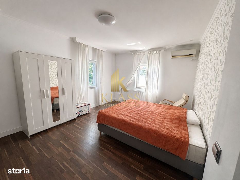 Casa moderna pentru inchiriere cu 4 dormitoare, gradina privata plus g
