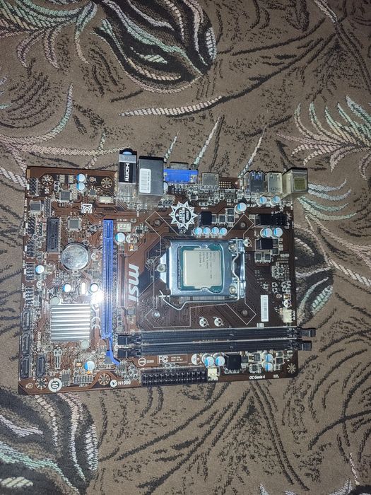 Продам Материнку и Процессор