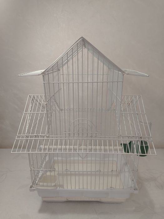 Продам клетку для мелких попугаев