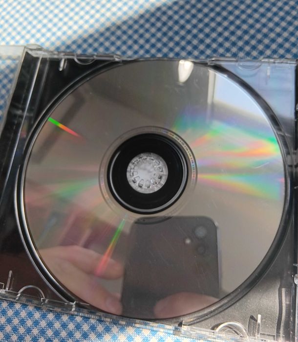 CD Cheloo, intitulat „Sindromul Tourette”, lansat în 2003 prin casa de discuri Rebel Music, Muzica Hip Hop Romanesc