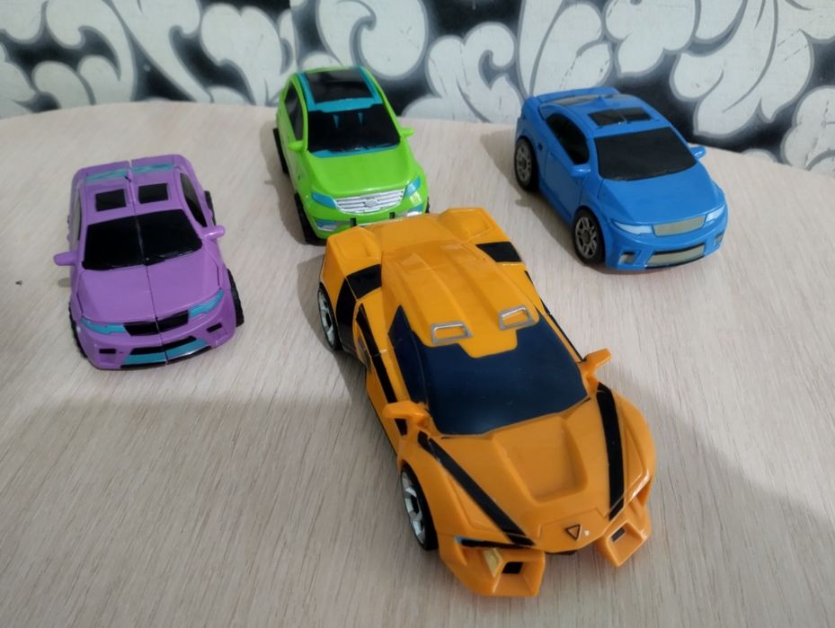 Игрушки машинки трансформеры