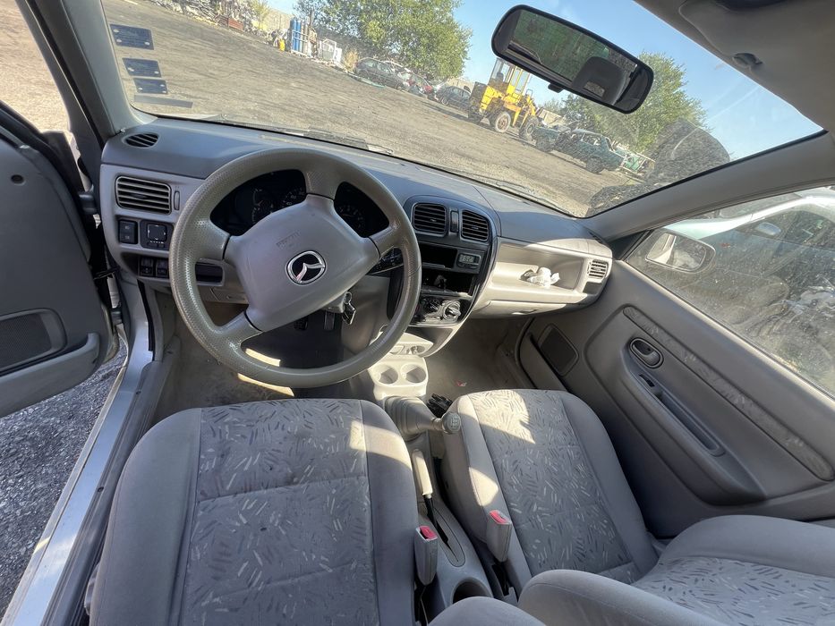 Мазда Демио (1.5i 16V 2000г. ) на части