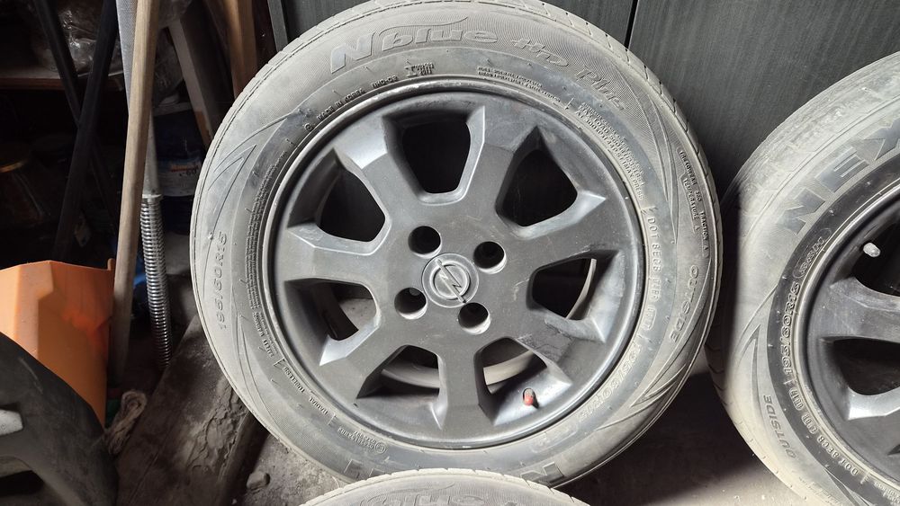 Оригинални джанти Opel 4x100 / 6Jx15 ET49 с гуми Nexen 195/60 R15