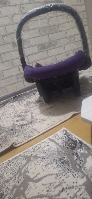 Bolalar uchun avtokreslo.