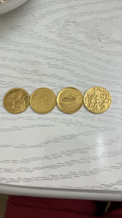 Золотые монеты 999