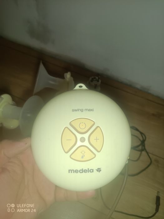 Молокоотсос электрический medela