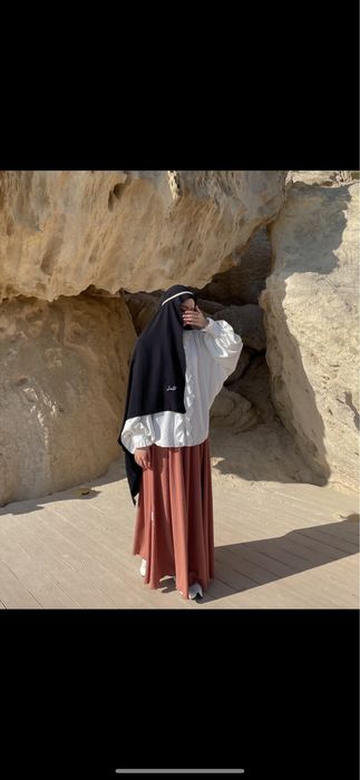 Покрытая қыздарға киімдер