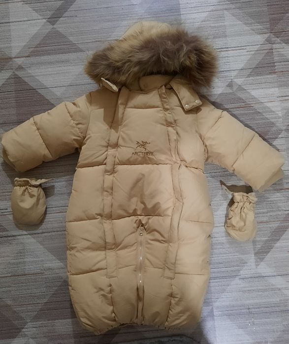 Продам новый зимний комбинезон детский