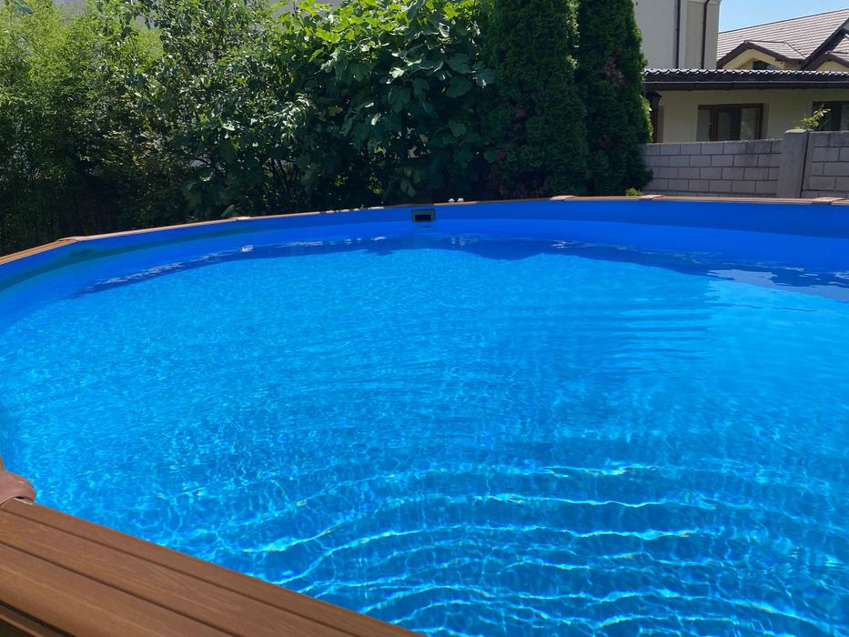 Piscina supraterana Gre Pacific ovala cu pereti metalici imitatie de lemn 730 x 375 h 120cm