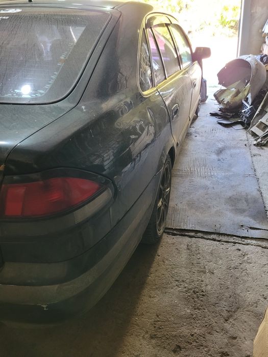 Мазда 626 птичка