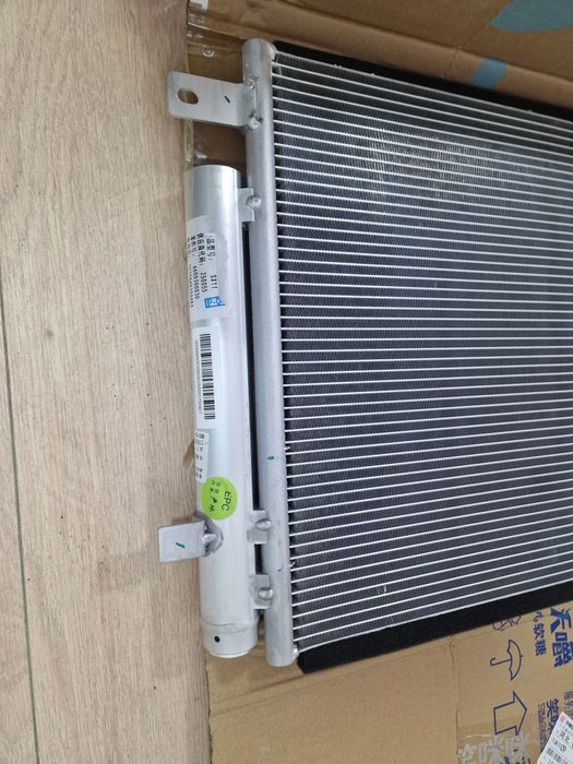 Радиатор охл./конд. Geely Emgrand