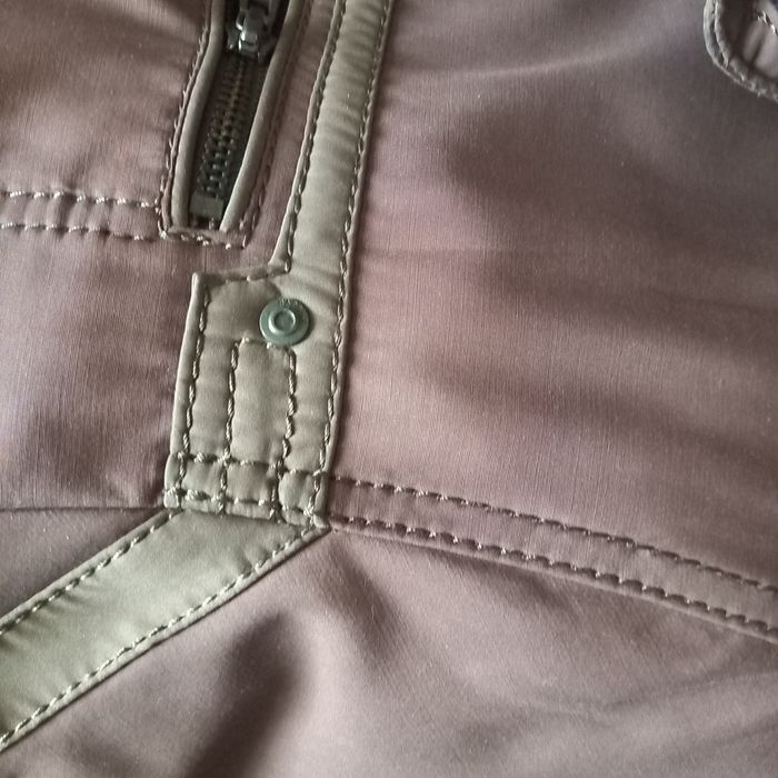 шапки и куртка Caprice.