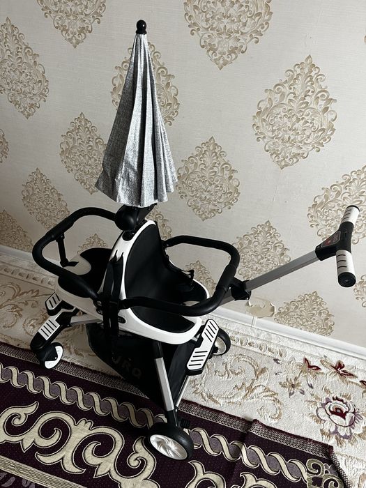 Екі балаға арналған коляска