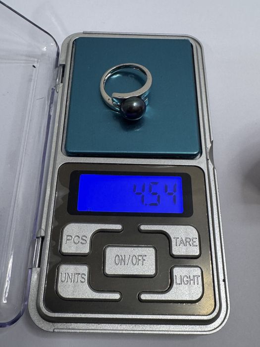 Inel argint 925 cu perla neagra si aquamarine.