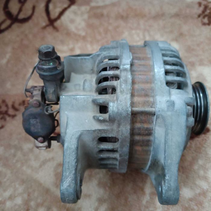 Продам генератор на авто Мазда обьем 1.8
 б.у