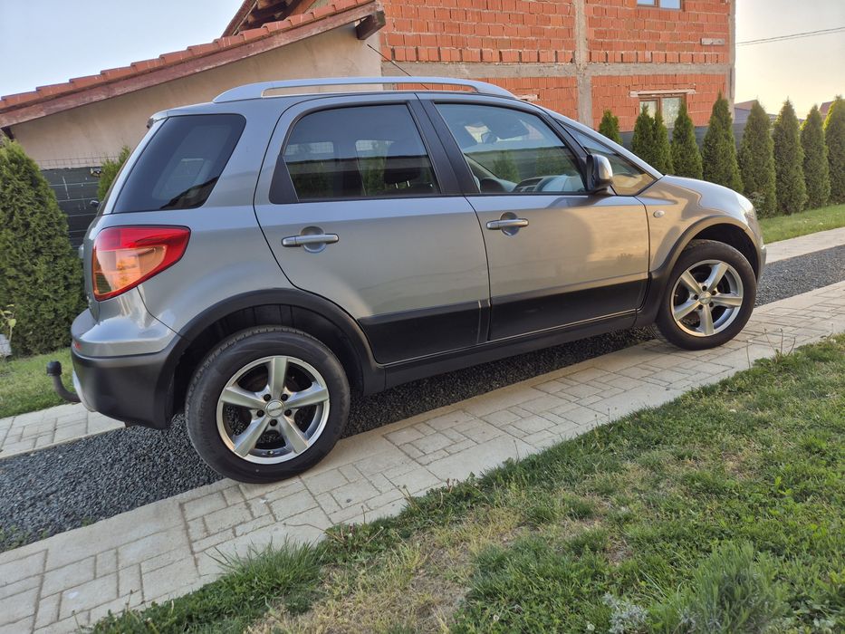 Fiat Sedici (Suzuki SX4) 1.9 Multijet 120 Cp  6+1 Viteze  4x4 Climatronic Navigatie