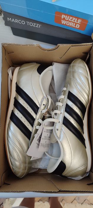 Продам кроссовки новые Adidas