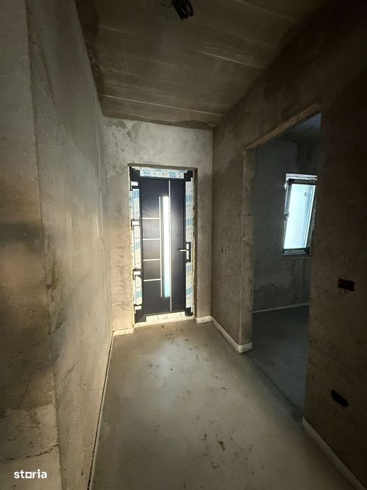 De vanzare casa semifinisata la 5 min de Roman,suprafata teren 1300mp