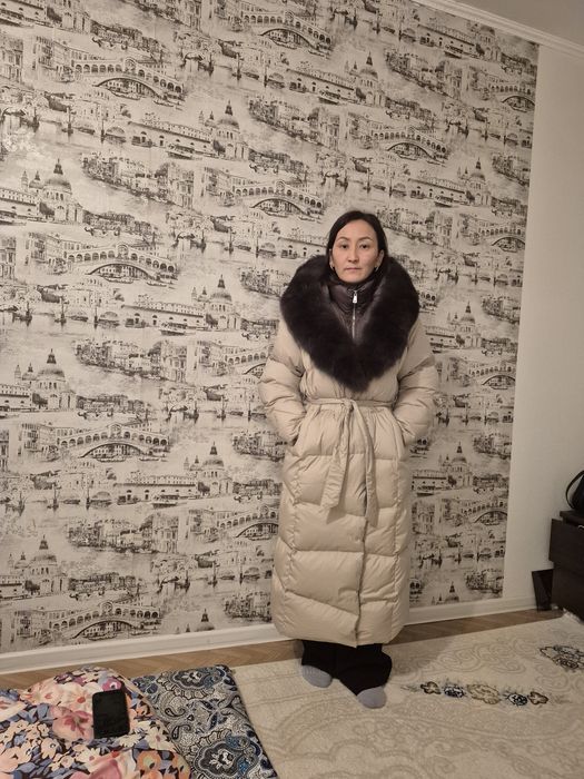 Продам пуховик зимний новый