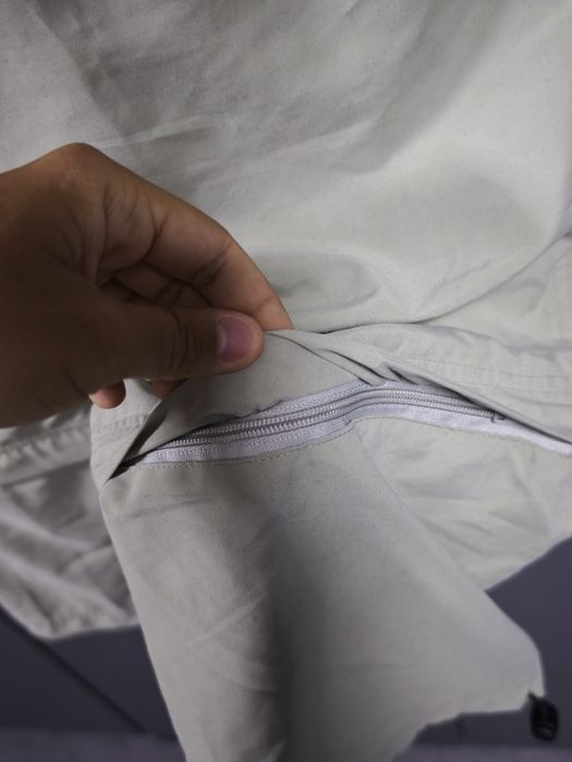 Pantaloni de fas Fubu care se fac scurti