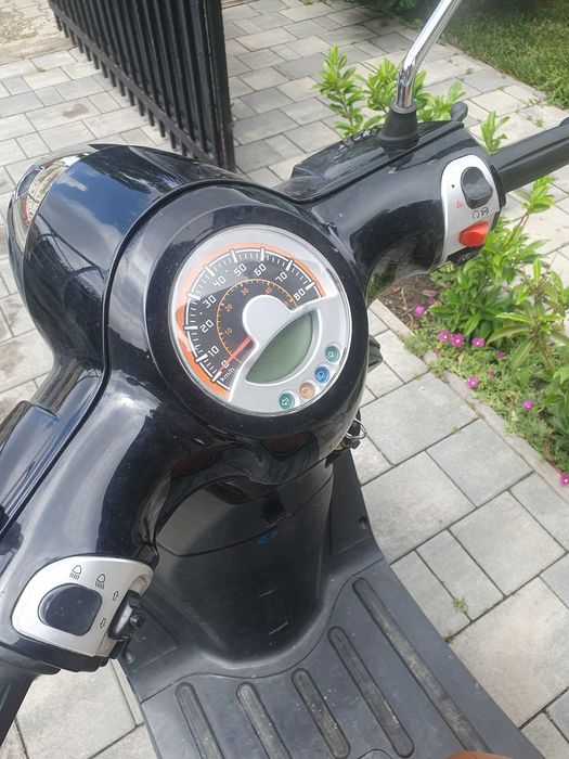 Scuter Kymco și Cruzer 50cm³
