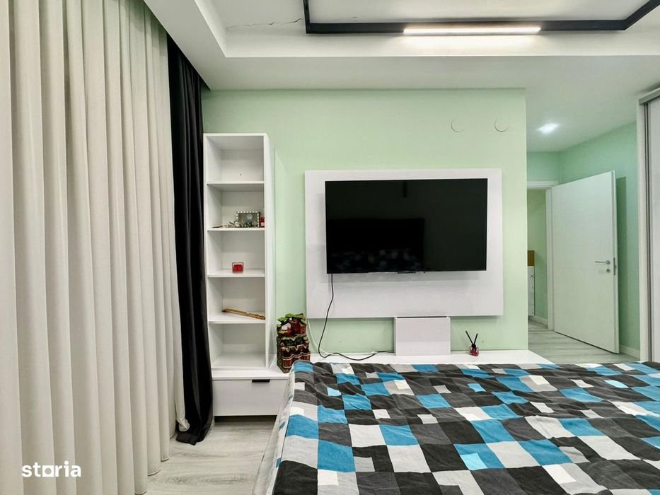 COSMOPOLIS - Apartament cu 3 camere si gradina, mobilat si utilat.