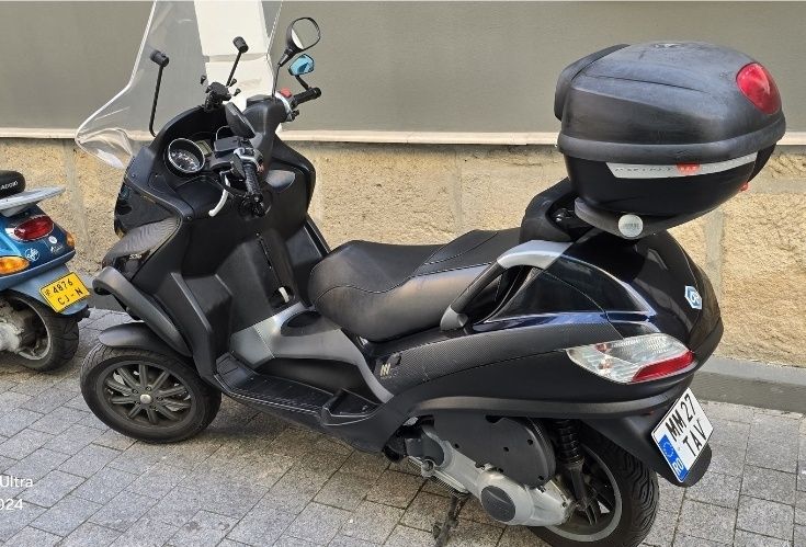 Scuter piagio mp3 , 250cc . 6000ei