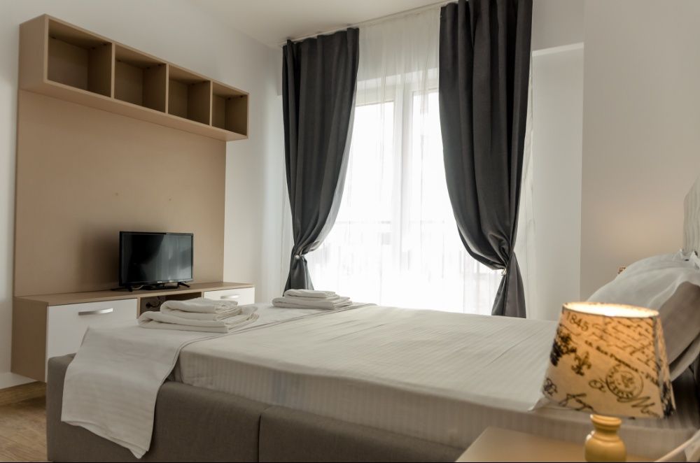 IS Cazare Apartamente 1-2-3 cam Regim Hotelier Iasi - GLAM Apartments