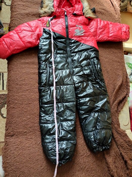 Продам зимнии комбинезоны