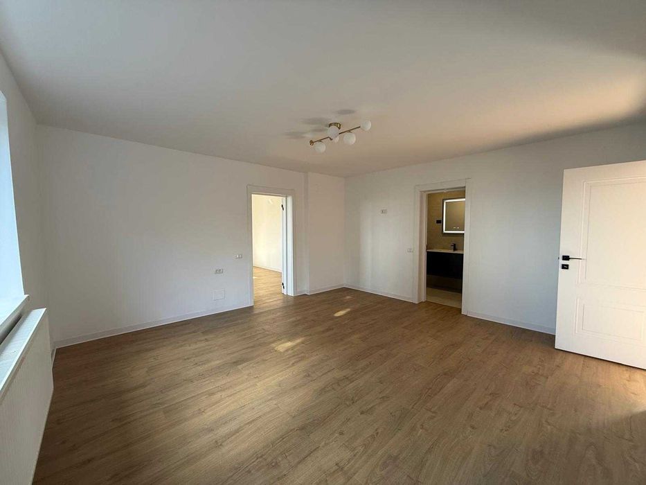 Apartament în casă cu curte terasata si garaj – la 5 minute de Centru