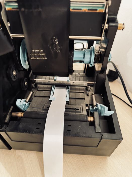 Принтер ленточный для этикеток Postek EM210