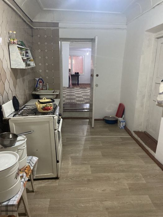 Двухэтажный дом с пристройкой