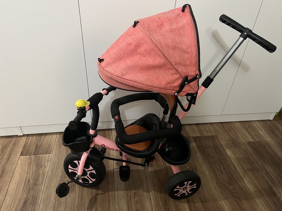 Детский велосипед с ручкой.