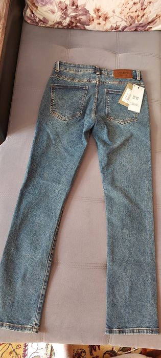 Брюки джинсы синии цвет