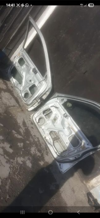 Двери митсубиси лансер