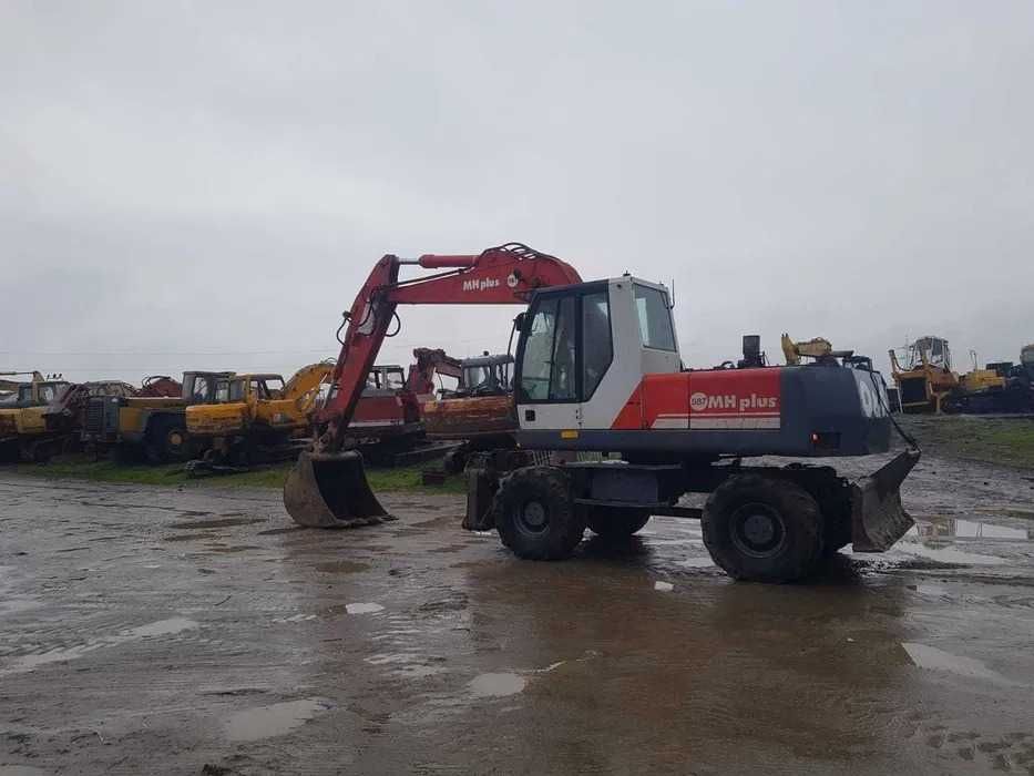 Dezmembrez excavator pe roti OK MH PLUS