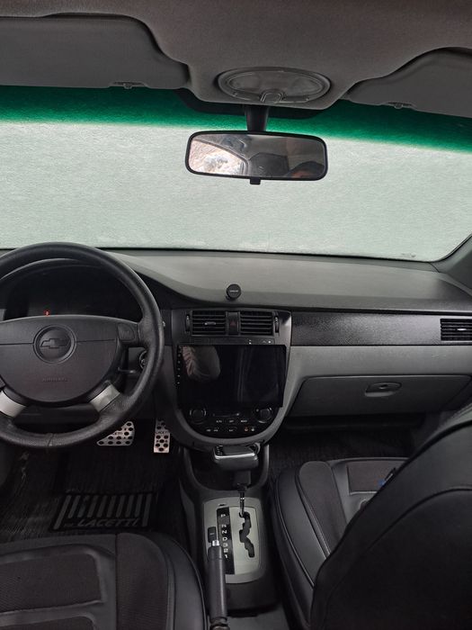 Ласетти 1.8 автомат петно