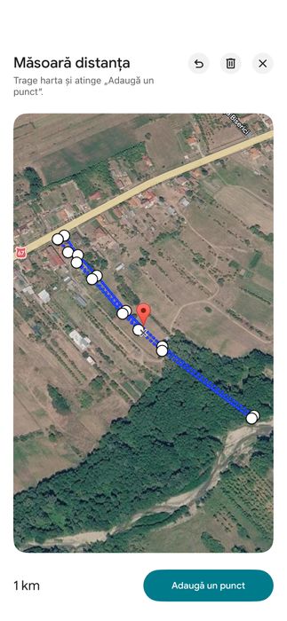 Intravilan intre case livada de pruni Polovragi 3000 mp dechidere la DN67
