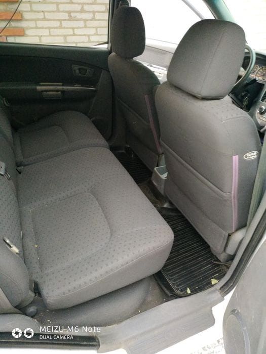 Автомобиль Kia Carens