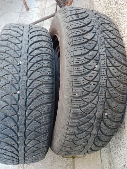Продавам зимни гуми с метални джанти 15 цола за Опел