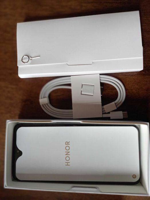 Мобилен телефон HONOR X7d Gold r и   Мобилен телефон Sony  Ericsson 800 i