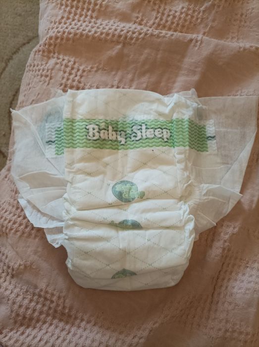 Подгузники  новые